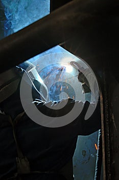 Ship building worker welding in the sipyard