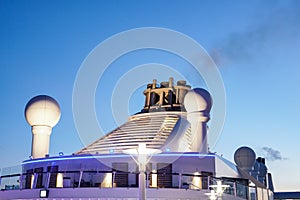 Ship chimney on upper deck of cruise liner photo