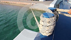 Ship coil with wrapped rope, tied for dock