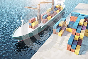 Ship with colorful cargo on water. Delivery and freight concept.