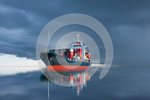 Ship with container import export on storm sky.