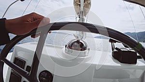 Ship control panel with steering wheel on the captain bridge