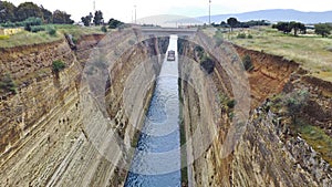 A ship on the Corinth Canal in the Peloponnese, Greece, Europe.