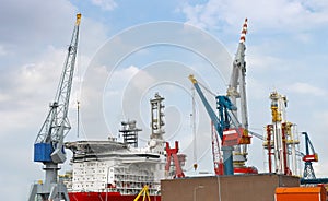 Ship and crane in shipyard