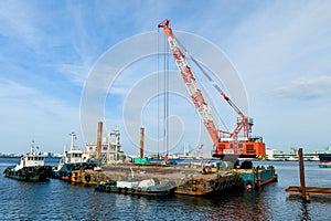 Ship dock with crane at construction site