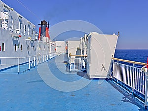 Ship ferry deck and red funnel during sail