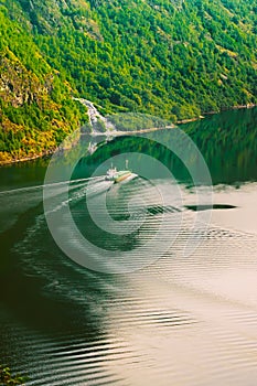 The ship floating in the water in narrowest fjord in Norway - Na