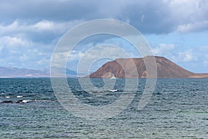 Ship in front of Lobos island on Canary Islands