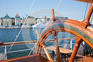 Ship helm and a view on Stockholm, Sweden