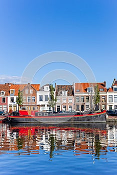 Ship and houses at a canal in Haarlem