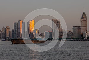 A ship in Huangpu rive at sunset in Shanghai