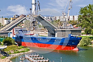 Ship leaving through bascule bridge