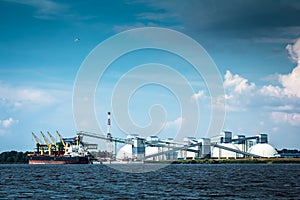 Ship loading work in the oil terminal in Riga, Latvia in the sum