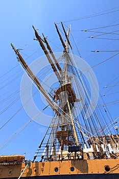 Ship mast against blue sky