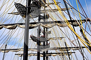 Ship mast with folded sails