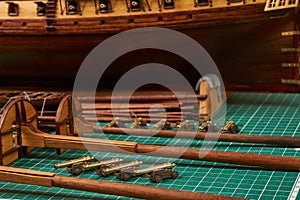 Ship model building in progress. Assembly of ship model from wood