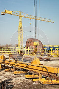 Ship and monumental crane in the shipyard