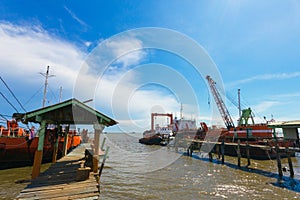Ship and monumental crane in the shipyard.