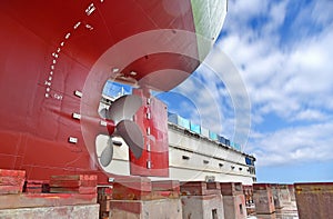 Ship Moored in floating dry dock with during repair and maintenance