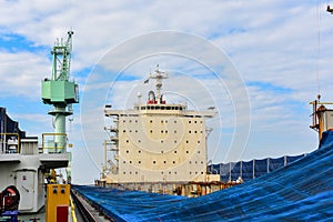 Ship Moored in floating dry dock with during repair and maintenance