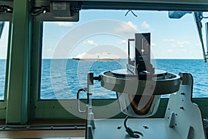 Ship navigation bearing military type on the side of the bridge when the ship is sailing parallel with cruise ship