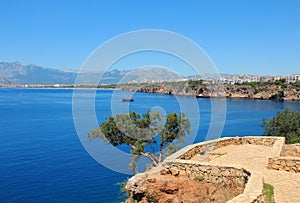 Ship near see port in Kaleici - old town in Antalya, Turkey