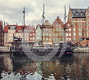 Ship near waterfront in Gdansk cityscape photo