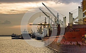Ship at port during sunset