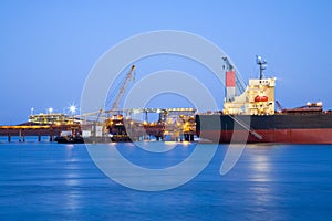 Ship and Port at Twilight