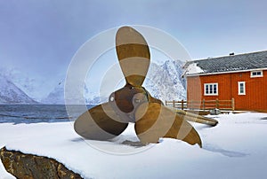 Ship propeller as a monument in the fishing village of Hamnoi, Lofoten Islands, Norway.