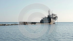 The Ship Ran Aground On The Beach After The Storm, Rusting Ship In The Sea