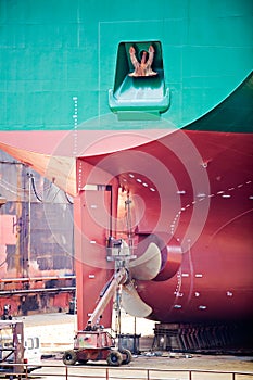 Ship repairs in dry dock photo