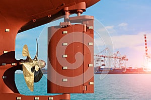 Ship Repairs In Dry Dock, Rudder with Propeller of Large cargo ship.