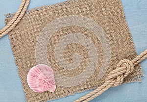 Ship rope on old wooden texture background