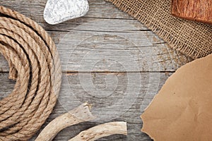 Ship rope on old wooden texture background