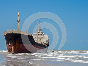 ship run aground on sand shore