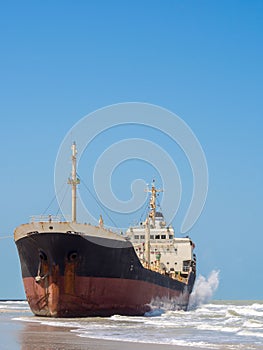 ship run aground on sand shore