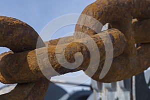 Ship rusty anchor chain on a winch