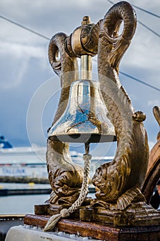 Ship`s Bell the old sailboat, close-up