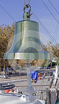 Ship`s bell on old sailing ship