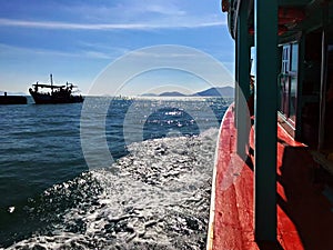 Sailing wave and the docking ship