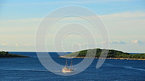 Ship Sailing Through Bay