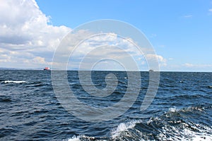 ship sailing on a beautiful day