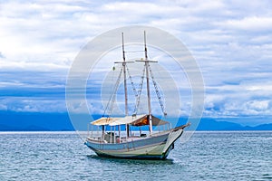 Ship sailing boats Praia de Palmas beach Ilha Grande Brazil