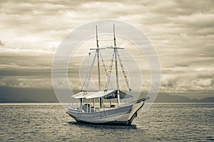 Ship sailing boats Praia de Palmas beach Ilha Grande Brazil