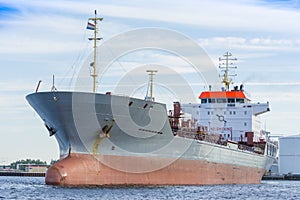 Ship is sailing in the port of Amsterdam.