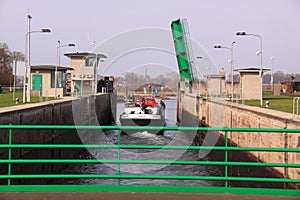 Ship sailing through sluice