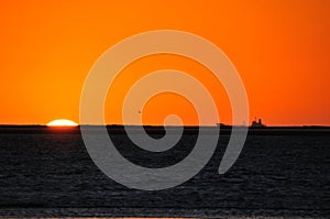 Ship silhouette against sunset