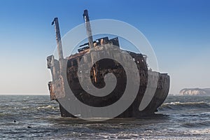 Ship stranded near the beach shore of ships` cemeteries in Angola photo