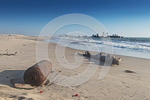 Ship stranded near the beach shore of ships` cemeteries in Angola photo